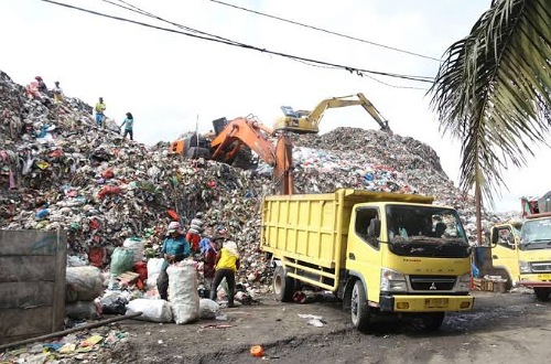 Ilustrasi LPS angkut tumpukan sampah Pekanbaru ke TPA (foto/int)